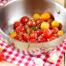 Tomates Méli Mélo confites au beurre, à l’ail et au romarin